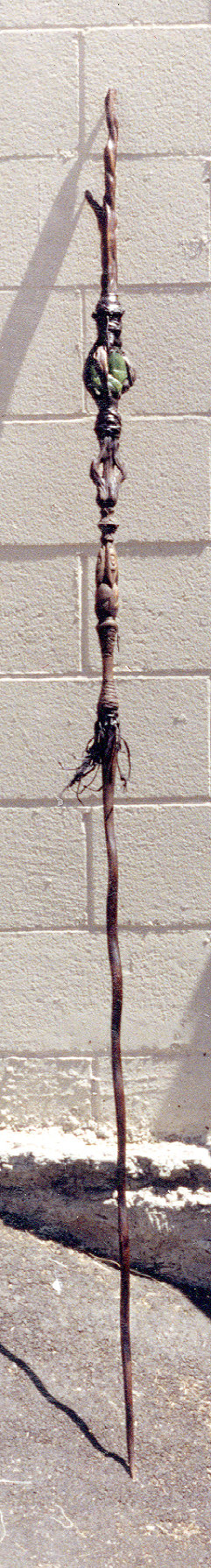 The Stargate ceremonial staff on the shop floor against a cinder-block wall, post-fabrication